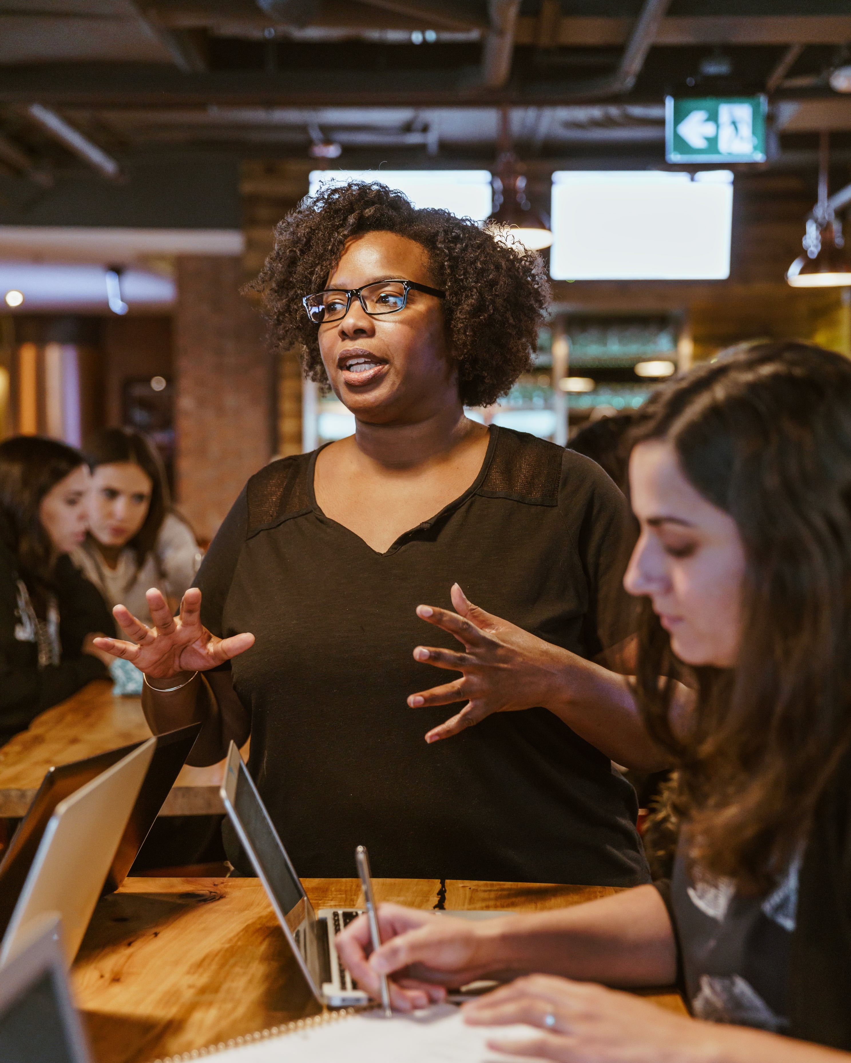 Teacher explaining a concept to students